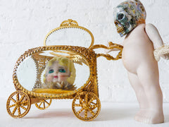 Carrying Ozma'z Head Antique German Bisque Doll with Ocean Jasper Crystal Skull